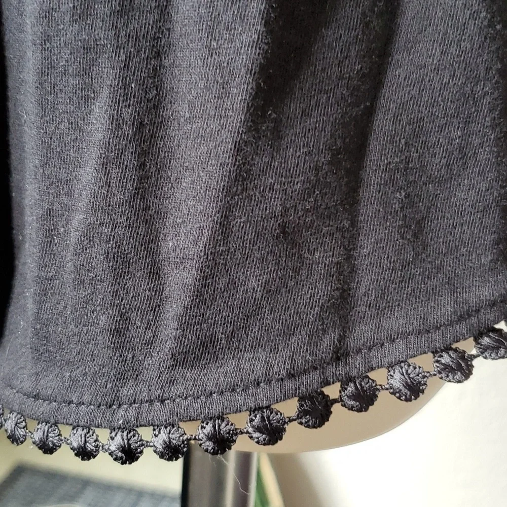 Like new, Romper black with ruffle and trim so cute split up the sides of short - Picture 4 of 7